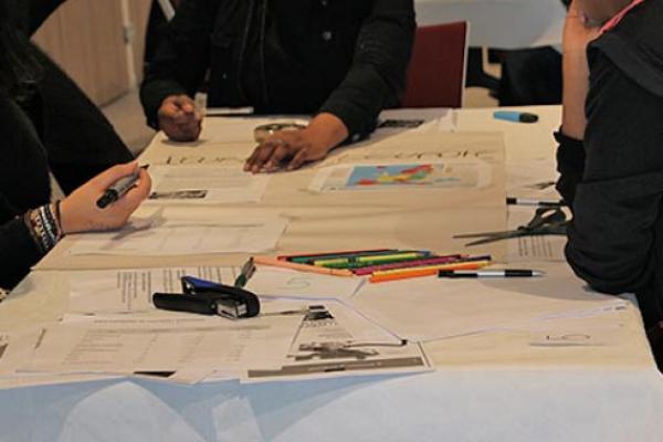 Visitors taking part in a group activity at the Jean Monnet House